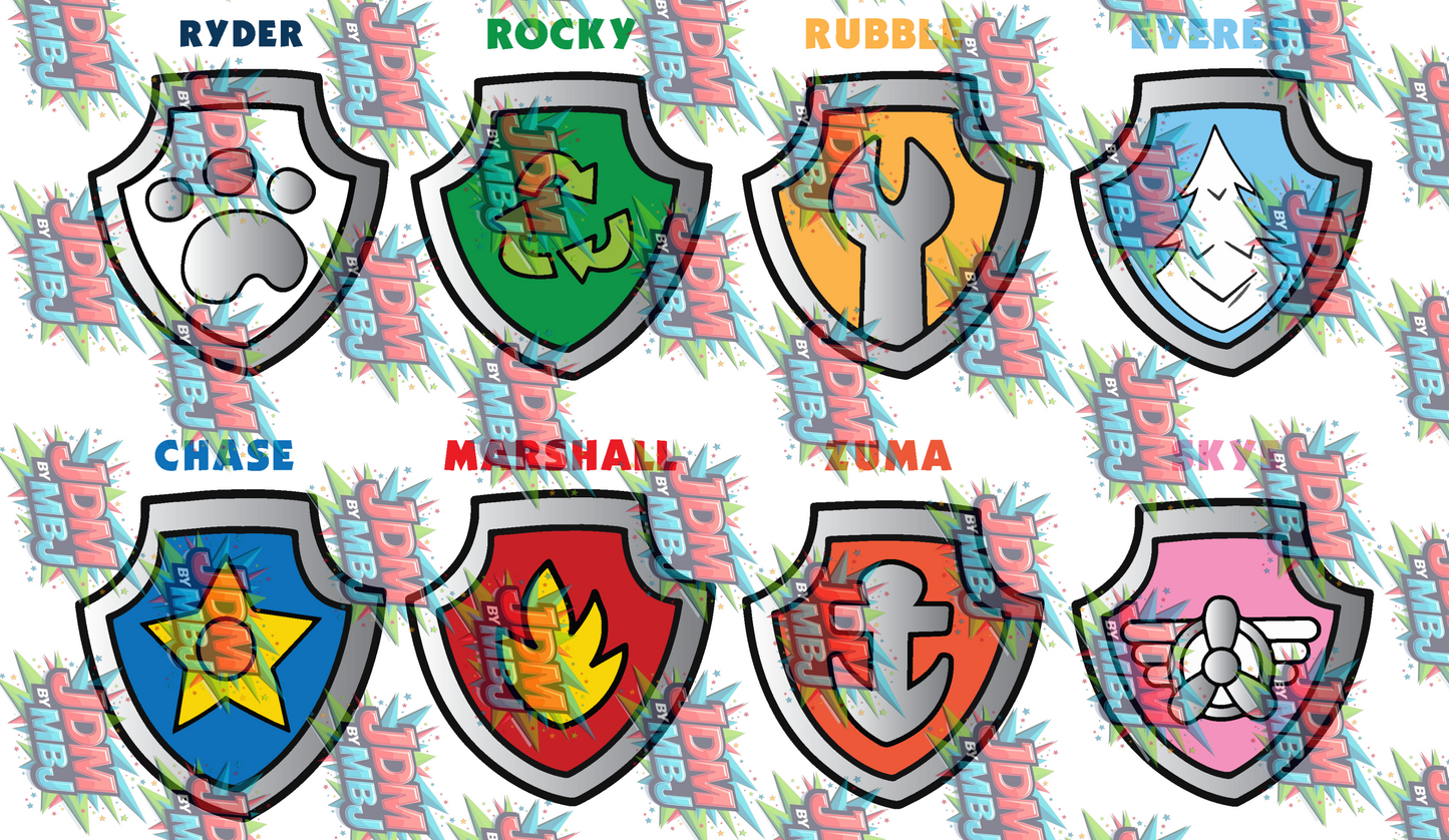 A sheet of eight colorful shield-shaped stickers featuring cartoon characters and names including JDM, MBJ, Rocky, Marshall, Ryder, Chase, and Rubble, set against a white background with a repeating JDM By MBJ watermark.