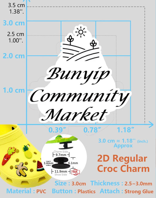 A digital image of a shoe charm featuring an animated chicken character with a red comb and black hands, popping out from a shoe resembling a television set. Units of measurement are shown around the image for scale.