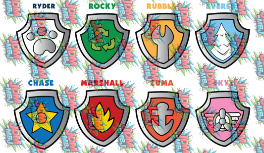 A sheet of eight colorful shield-shaped stickers featuring cartoon characters and names including JDM, MBJ, Rocky, Marshall, Ryder, Chase, and Rubble, set against a white background with a repeating JDM By MBJ watermark.